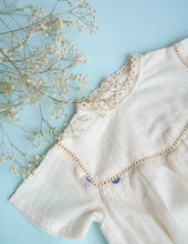Load image into Gallery viewer, A zoomed out  picture of Baby Girl Romper and Detachable Vest | Cotton | Indigo ,a baby girl dress without the vest against a blue background