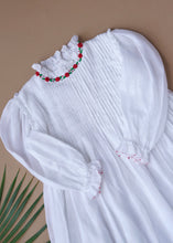 Load image into Gallery viewer, Beautiful white dress with pintuck detailing across the bust and ruffles running across the neckline with a leaf aside.