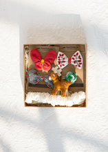 Load image into Gallery viewer, Beautiful brown box containing some Christmas hair accessories with some toys, placed on a white background