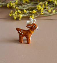 Load image into Gallery viewer, A brown color cute toy is placed on a brown background with some dry flowers.