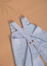 गैलरी व्यूवर में इमेज लोड करें, A set of Pure Cotton Pleated Top for baby girl dresses kept on a beige colored background