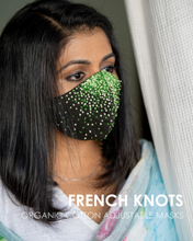 Load image into Gallery viewer, A girl wearing a French knots adjustable face mask.