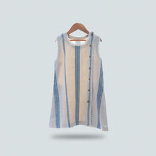 Load image into Gallery viewer, A beautiful white A-line shift dress with flattering vertical blue stripes and laced hemline is hanged using hanger.

