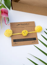 Load image into Gallery viewer, Handmade Crochet Flower Rakhi for Infants and Kids | Yellow
