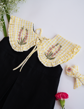 गैलरी व्यूवर में इमेज लोड करें, A zoomed in picture of Baby Girl Romper and Detachable Vest | Cotton Jamdani | Polka Dot,a baby girl dress with a yellow bow
