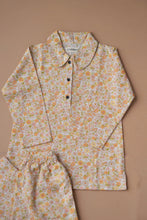 Load image into Gallery viewer, Beautiful cotton pajamas set kept upon a peach background.

